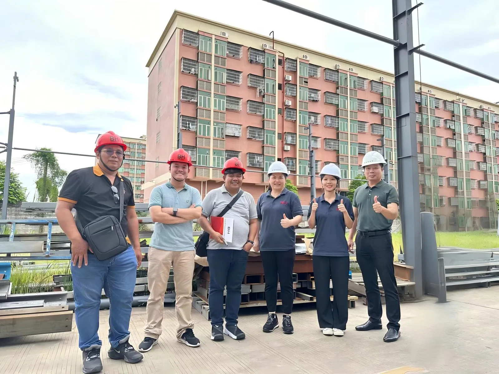 Clients touring the BH Housing factory